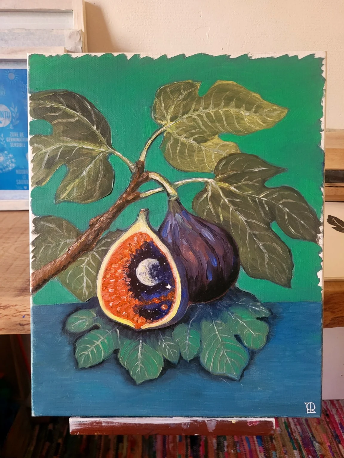 Peinture d'une figue ouverte contenant un paysage cosmique